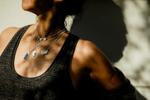 Load image into Gallery viewer, Female model wearing multiple Zink Metals’ necklaces including the triple broken silver necklace and multiple gemstone, pearl and sterling silver necklaces