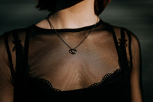 Load image into Gallery viewer, Model wearing dark steel necklace with sterling silver chain