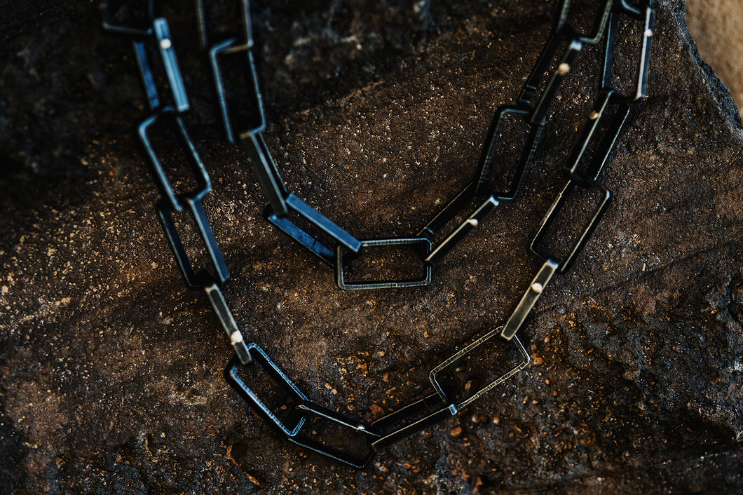 Close up of large chain necklace